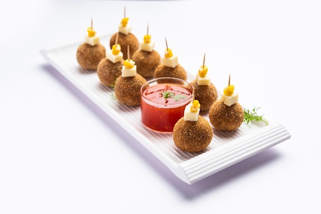 Corn Cheese balls with dip popular party snack from India