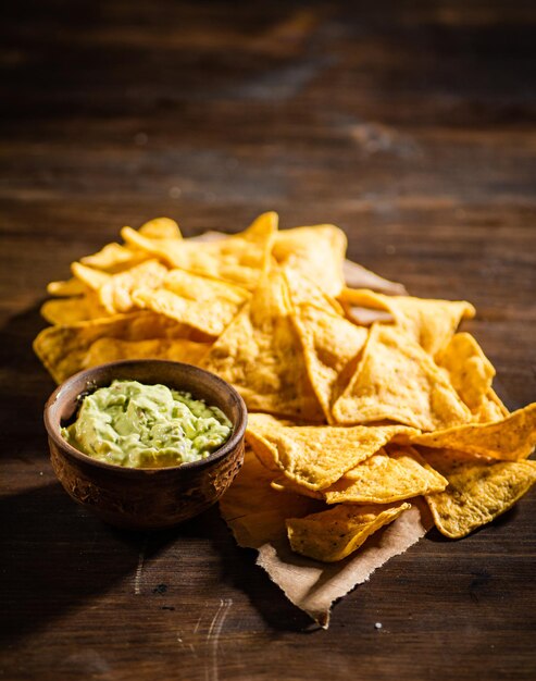 Corn chips with avocado sauce