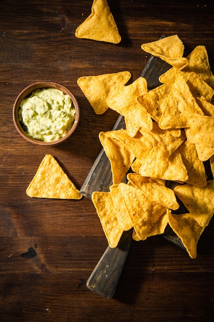 Corn chips with avocado sauce