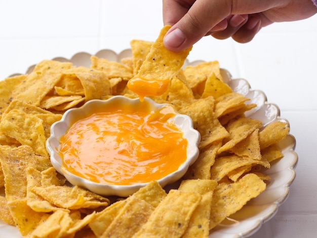 Corn Chips with cream cheese isolated in white background