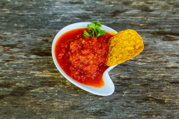 Corn chipswith spicy adjika salsa