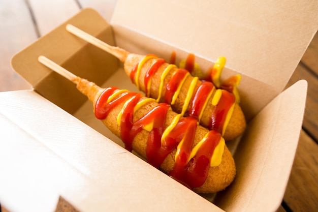 Corn dog in paper box