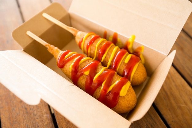 Corn dog in paper box