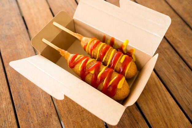 Corn dog in paper box