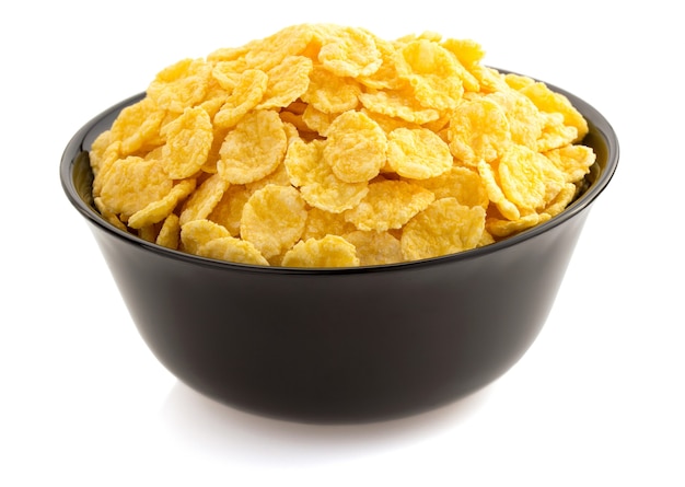 Corn flakes in bowl  isolated on white