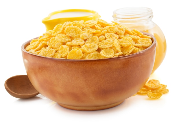 Corn flakes in bowl isolated on white