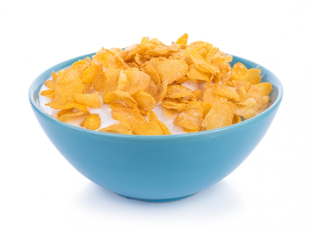 Corn flakes with milk in bowl isolated