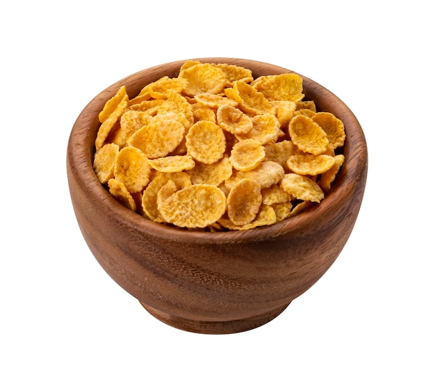 Corn flakes in wooden bowl isolated