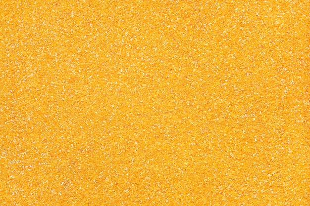 Corn grits close up as background