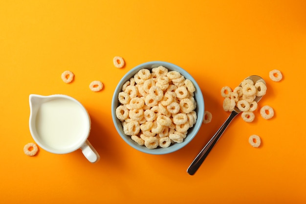 Corn rings in glaze for breakfast on a colored background