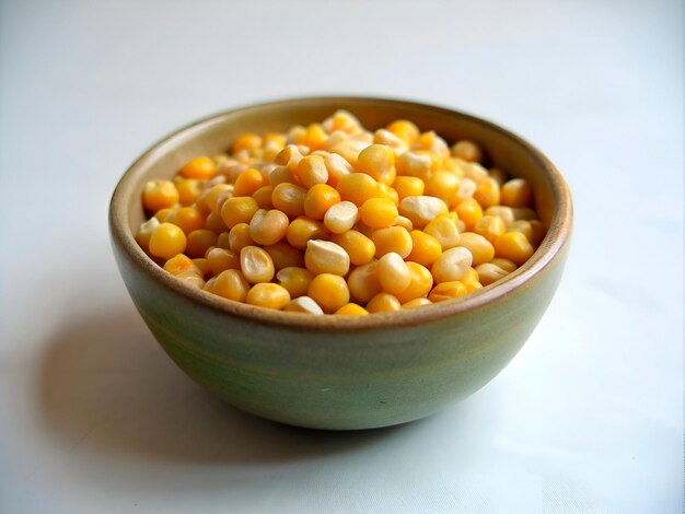 corn seeds in a green bowl