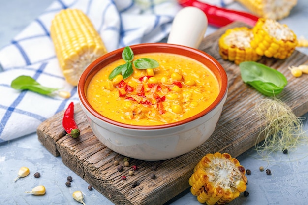 Corn soup with leeks and hot chili peppers