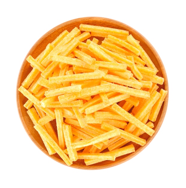 Corn sticks in a bowl on white background