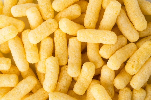 Corn sticks on a white background