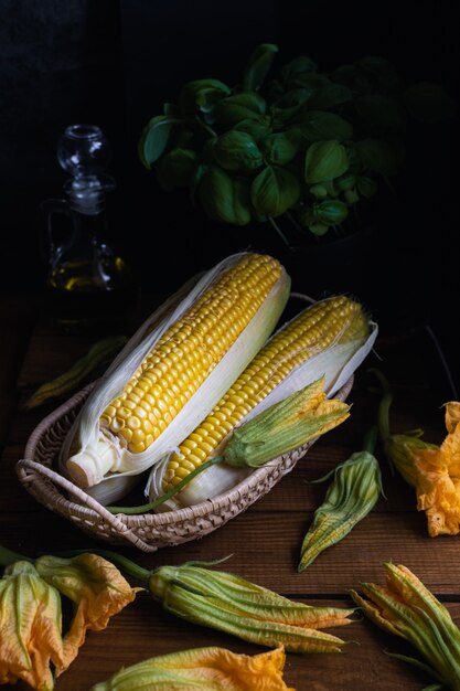 Corn, zucchini flowers and basil