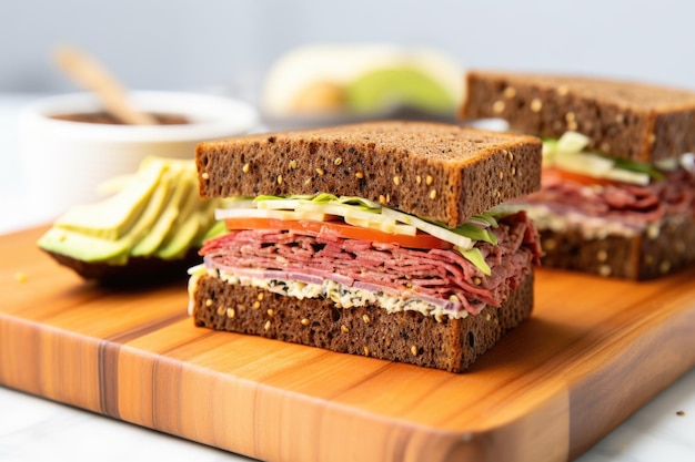 Corned beef and coleslaw sandwich on swirl rye bread on a cafeteria tray