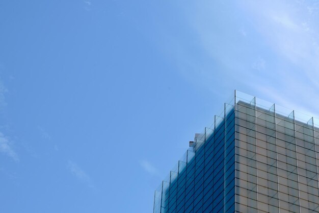 Corner of building covered with glass Minimal facade