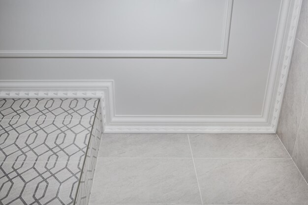 Corner of ceiling cornice with intricate crown molding