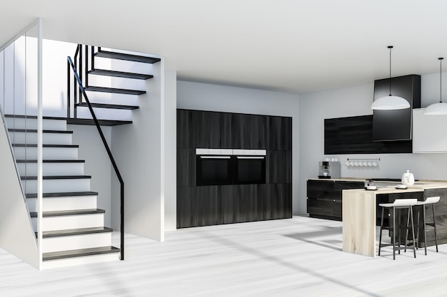 Corner of modern kitchen with white walls, wooden floor, wooden countertops with bar, dark wooden closet with built in stoves and a staircase. 3d rendering