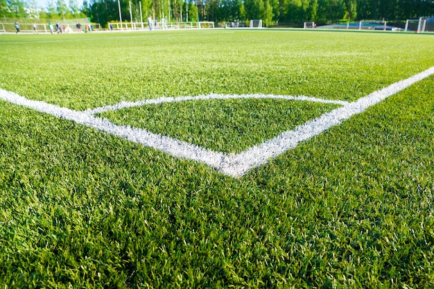 Corner soccer field on green artificial grass