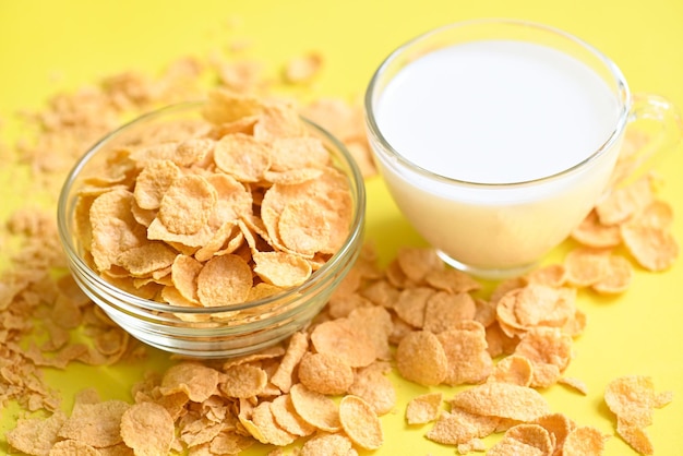 Cornflakes with milk on yellow background cornflakes bowl breakfast food and snack for healthy food concept morning breakfast fresh whole grain cereal