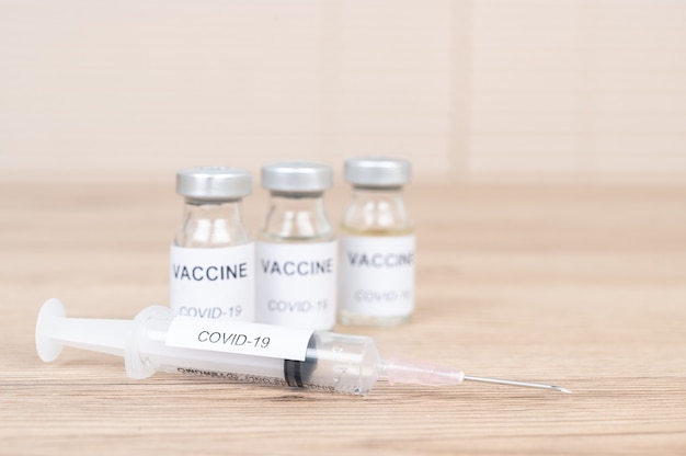 Coronavirus Covid-19 Vaccine vial Put on the doctor's desk