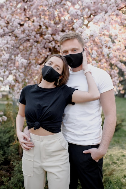 Coronavirus Covid19 Stay at home Stay safe concept Young couple wearing masks