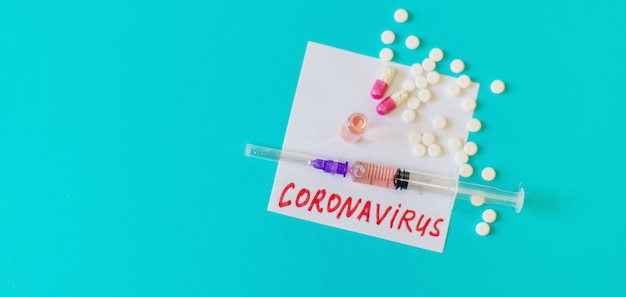 Coronavirus treatment and vaccination concept. Selective focus.