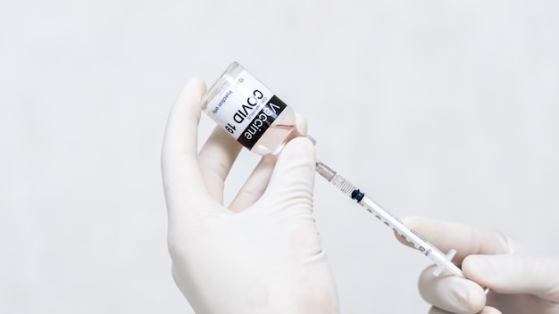 Coronavirus vaccine with syringe