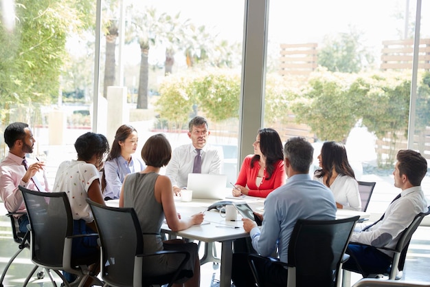 Corporate business team in discussion in a meeting room