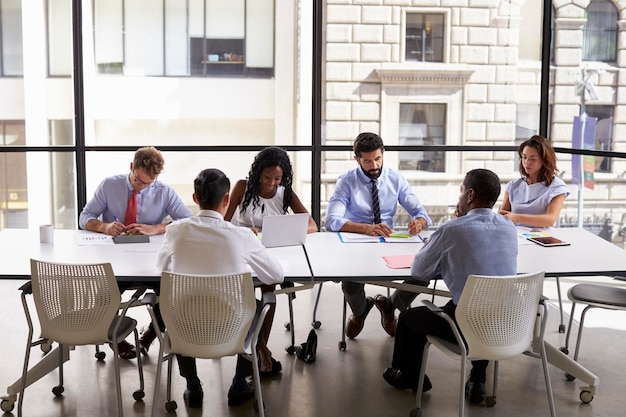 Photo corporate business team working in a modern open plan office