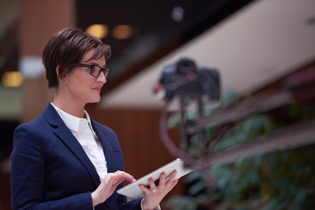 corporate business woman working on tablet computer  at modern office interior