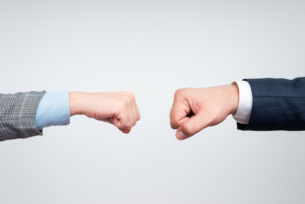 Corporate Businessmen Handshake Indoors.Two People Professionally Well Dressed Gesturing Togetherness.Working Colleague Partners Sign Deal In Agreement To Contract