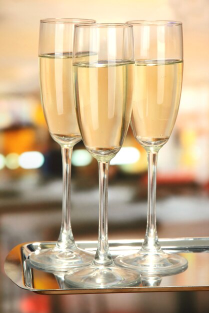 Corporate party: sparkling champagne glasses on tray