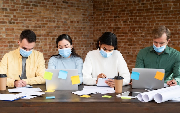 Corporate workers brainstorming together