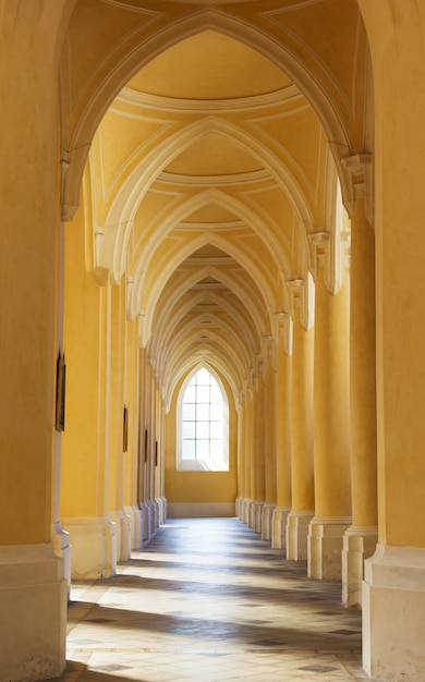 The corridor in the temple. Lancet window.