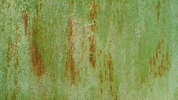 Photo corroded painted green metal surface