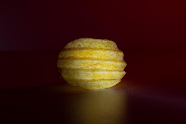 Corrugated chips in red light on a background