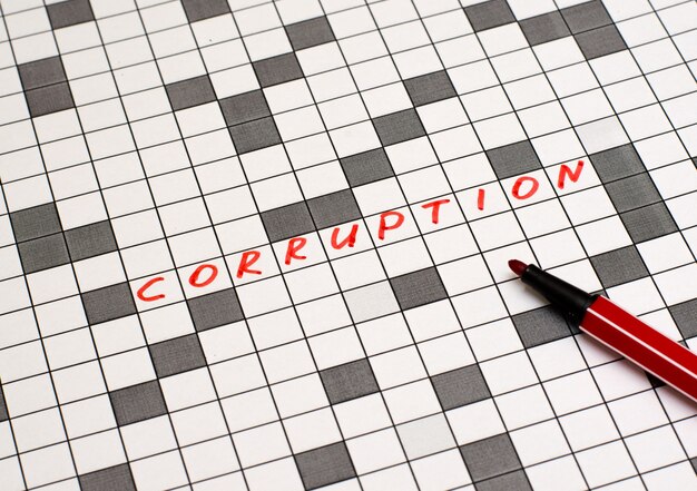 Corruption. Text in crossword. Red letters