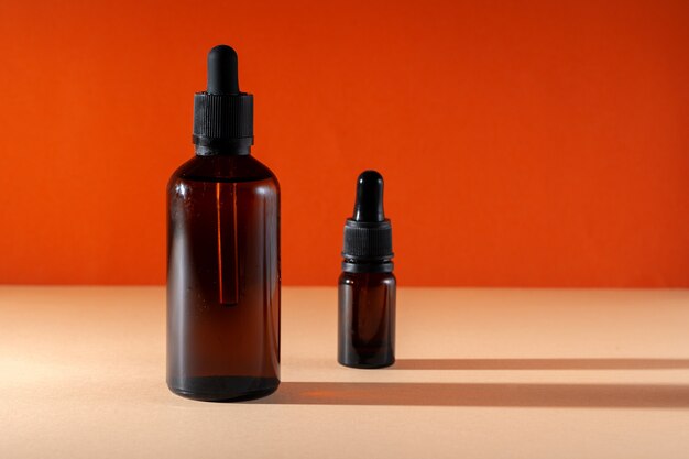 Cosmetic aromatic spa oil in brown glass bottle