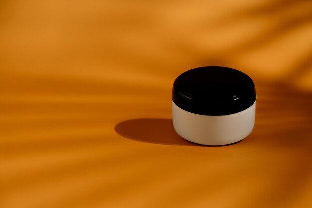 Cosmetic container or moisturizer jar mockup on minimalistic background