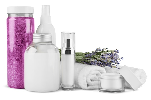 Cosmetic containers and flowers isolated on white