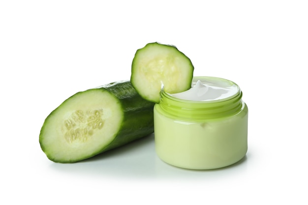 Cosmetic cream and cucumber isolated on white surface