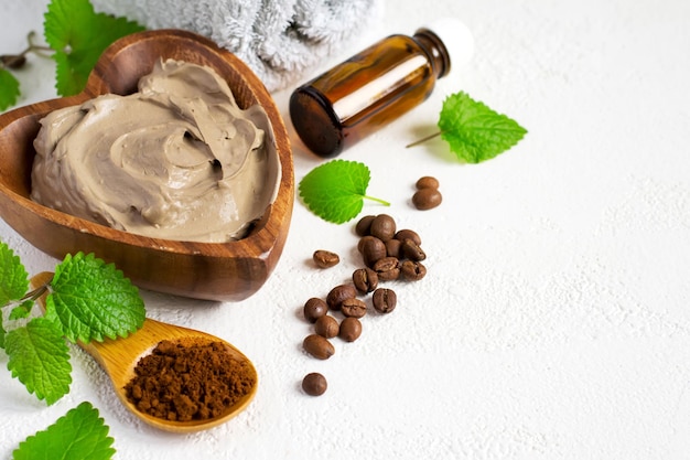 Cosmetic face mask and body made  clay, mint leaves Coffee beans and essential oil.