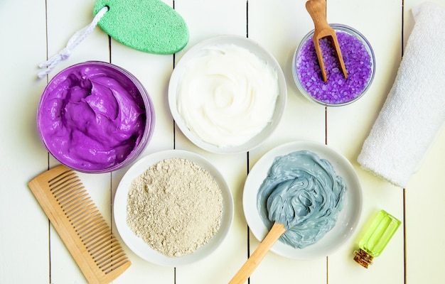 Cosmetic objects for spa procedures on a white background. Selective focus.