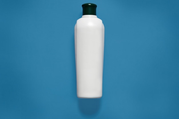 Cosmetic package, mockup, white empty plastic bottle with black cap