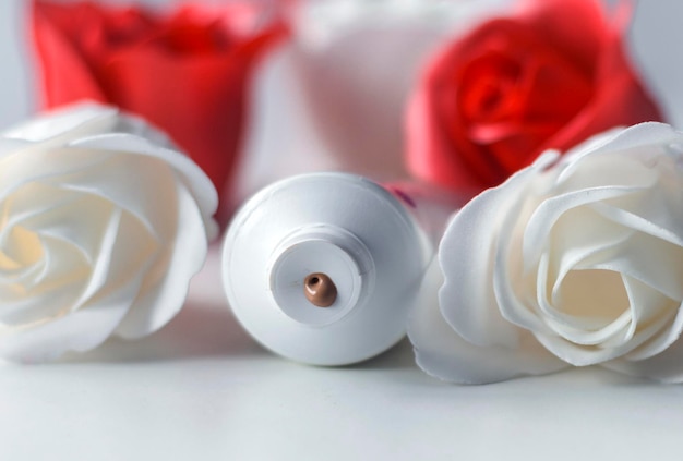 cosmetic product in a tube on a bong background with roses