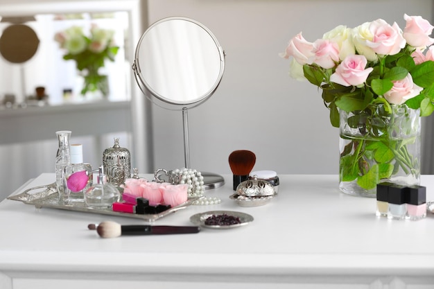 Cosmetic set on light dressing table