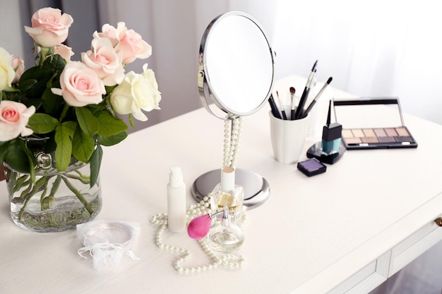 Cosmetic set on light dressing table