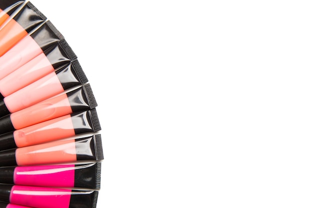 cosmetica, make-up en beauty concept - close-up van lipgloss tubes